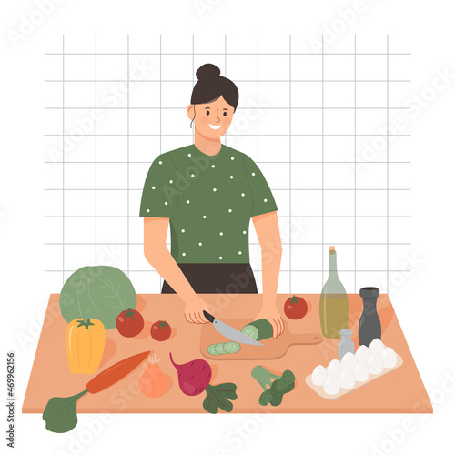 Happy woman cooking healthy dinner flat vector illustration. Cute female character preparing vegetable salad. Healthy diet concept. Girl cutting cucumber for a meal
