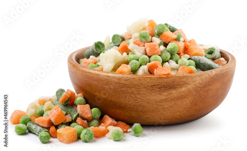 Mix frozen vegetables in a plate on a white background. Isolated