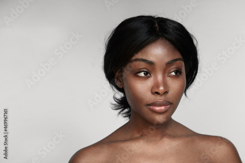 African american woman with clean healthy skin on wall.Space for text. © face_reader_img