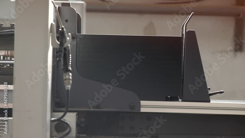 Production process in a furniture factory, woodworking machine mechanism close up. Workflow in a furniture factory. Woodworking factory