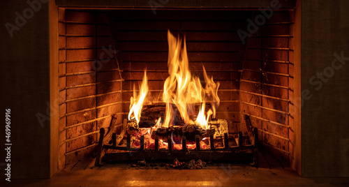 Fotografiet Christmas time, cozy fireplace