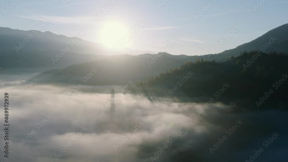 Autumn forest mountain top dawn fog drone view Autumn forest mountain top dawn fog drone view
