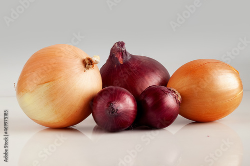 Onion bulbs on a light background