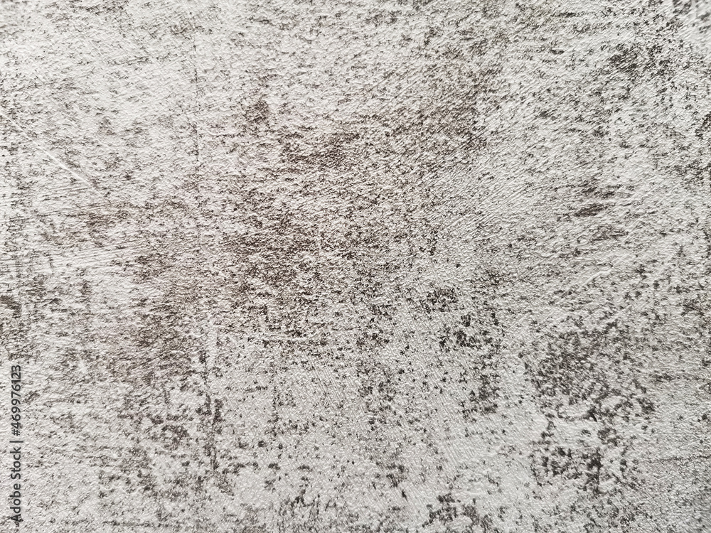 Gray-brown texture with the effect of an old shabby wall Gray-brown texture with the effect of an old shabby wall