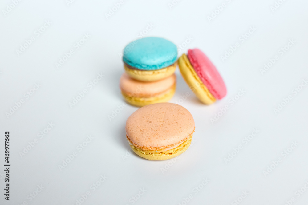 Macaroons lie on a white background Macaroons lie on a white background