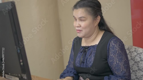 Authentic disabled blind person woman using computer with screen readers the assistive technology software program for people with vision disabilities in workplace.