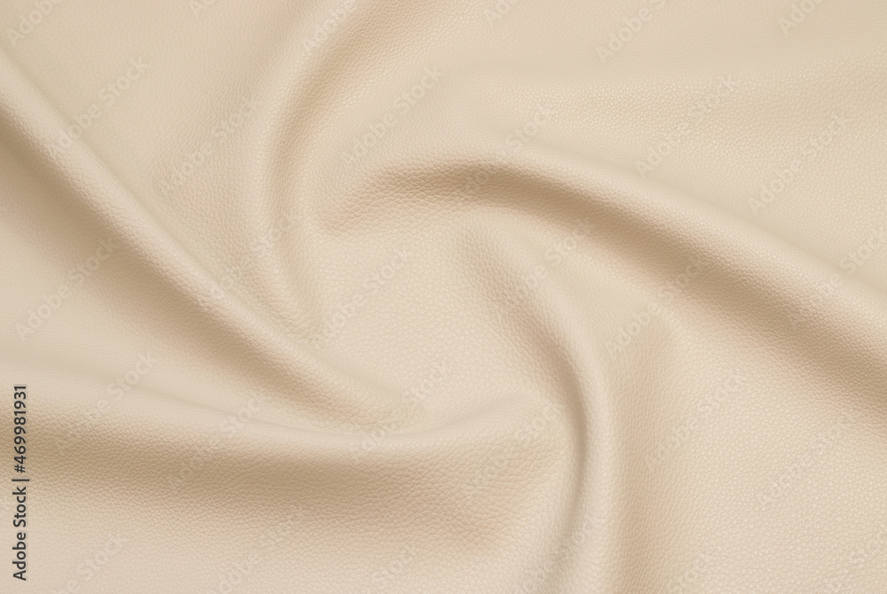 beige artificial leather with waves and folds on PVC base