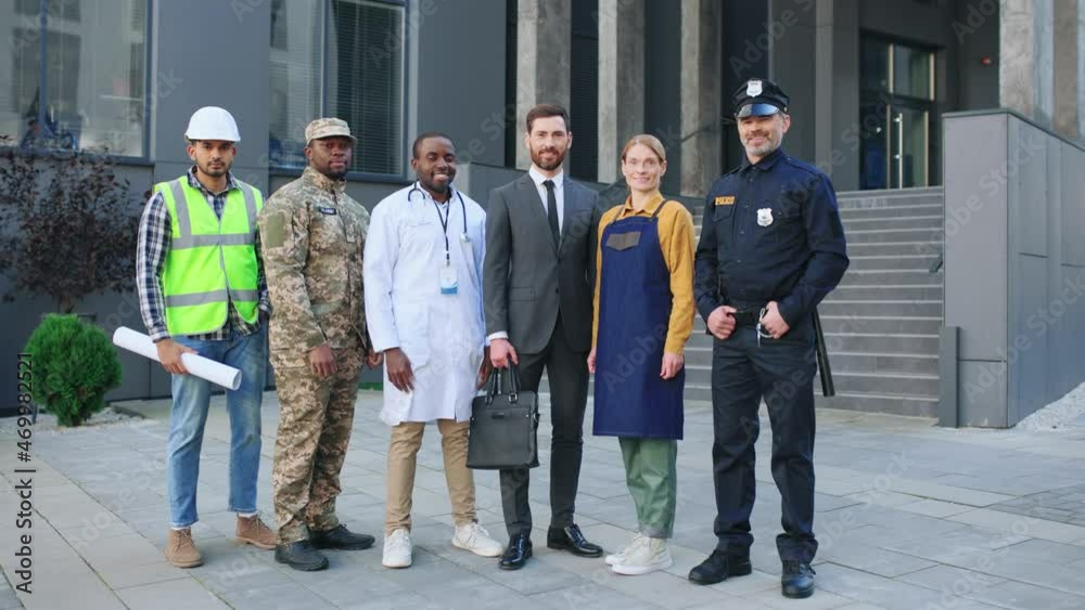 Full length view of the diverse people of different occupations standing at the street and posing to the camera. Jobs concept