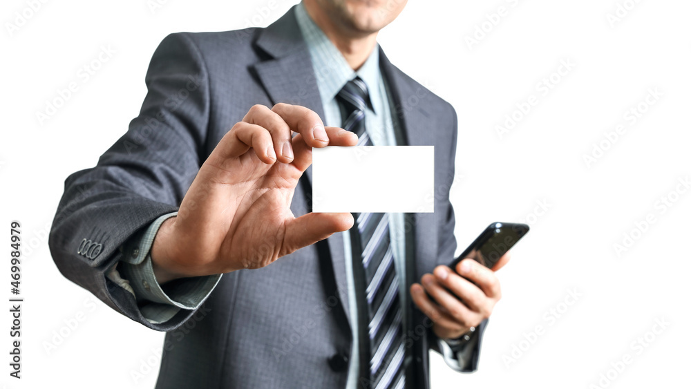 Hand of businessman in suit holds business card mockup, selective focus, isolated on white background Hand of businessman in suit holds business card mockup, selective focus, isolated on white background