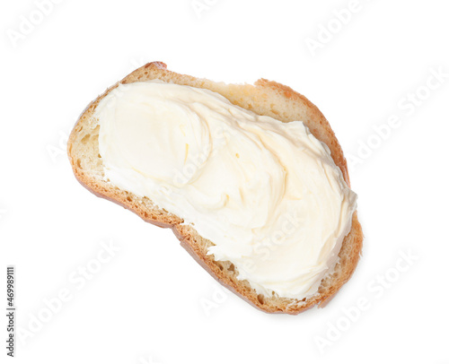 Slice of bread with tasty cream cheese isolated on white, top view