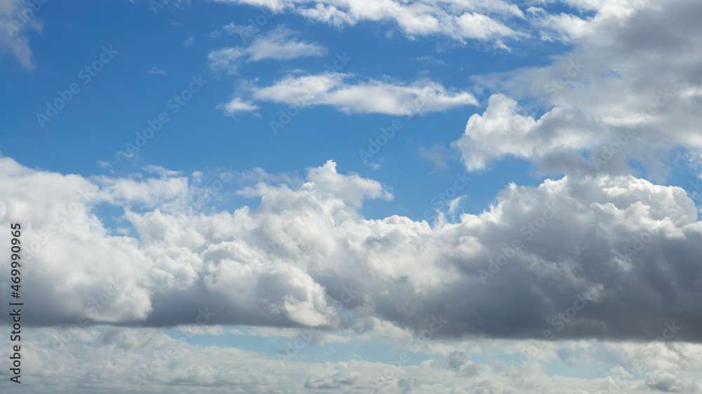 Cumulus clouds with blue sky on a sunny day of summer. Beautiful cloudscape