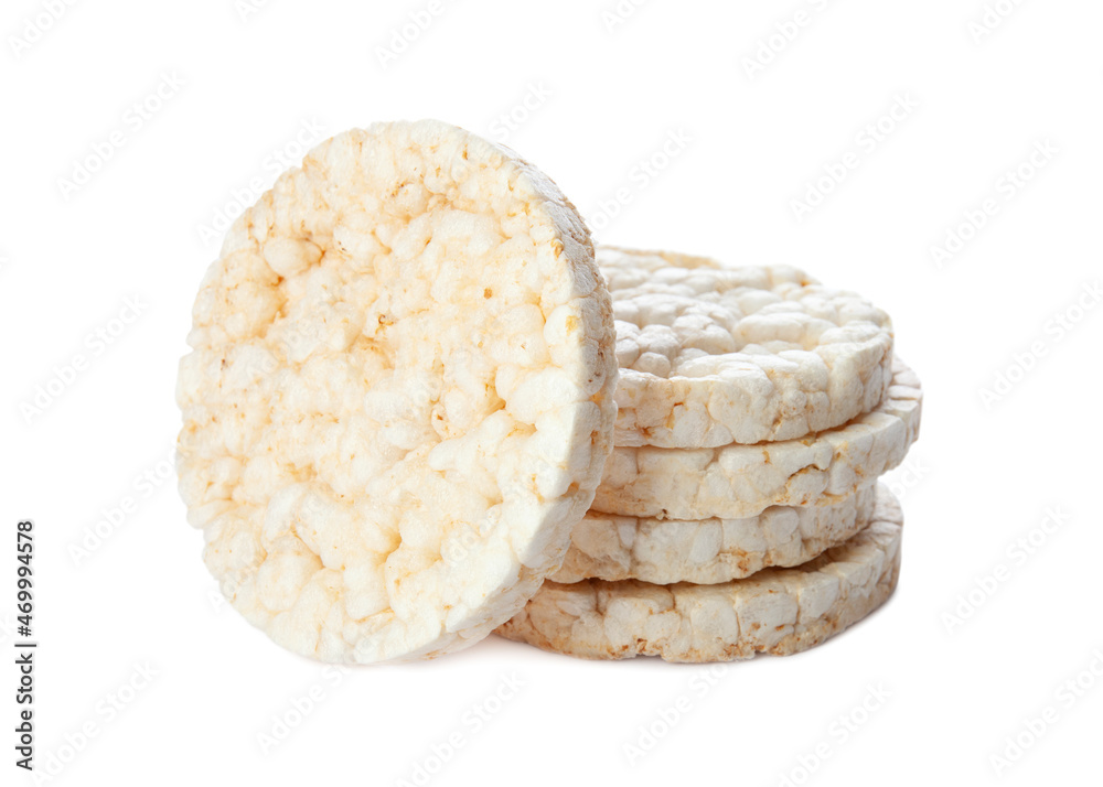 Stack of puffed rice cakes isolated on white background. Healthy crunchy snack. Wholegrain crisp bread Stack of puffed rice cakes isolated on white background. Healthy crunchy snack. Wholegrain crisp bread