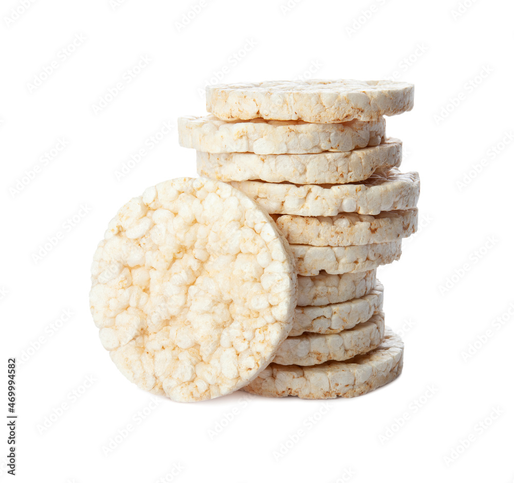 Stack of puffed rice cakes isolated on white background. Healthy crunchy snack. Wholegrain crisp bread Stack of puffed rice cakes isolated on white background. Healthy crunchy snack. Wholegrain crisp bread