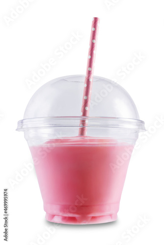 Milk fruit cocktail smoothie in a plastic glass with a straw on a white isolated background