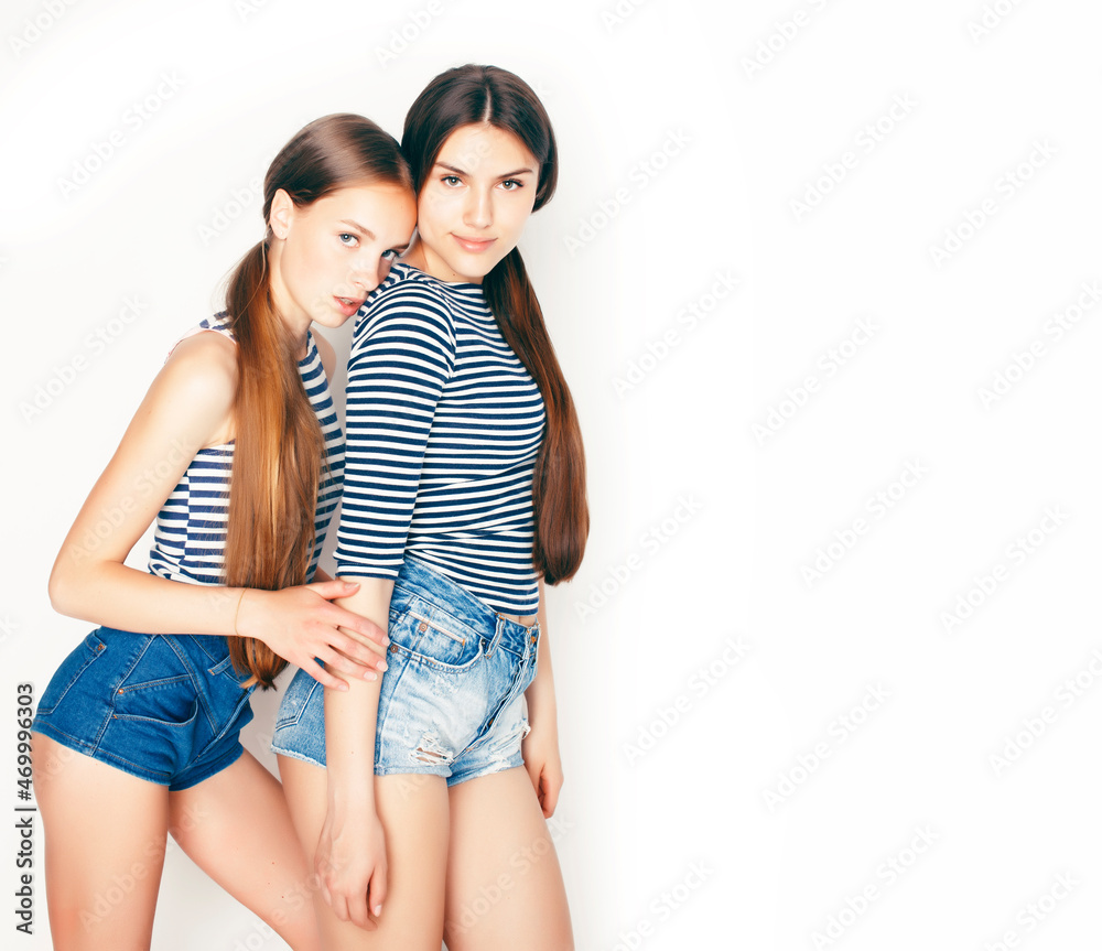 Naklejka premium best friends teenage girls together having fun, posing emotional on white background, besties happy smiling, lifestyle people concept