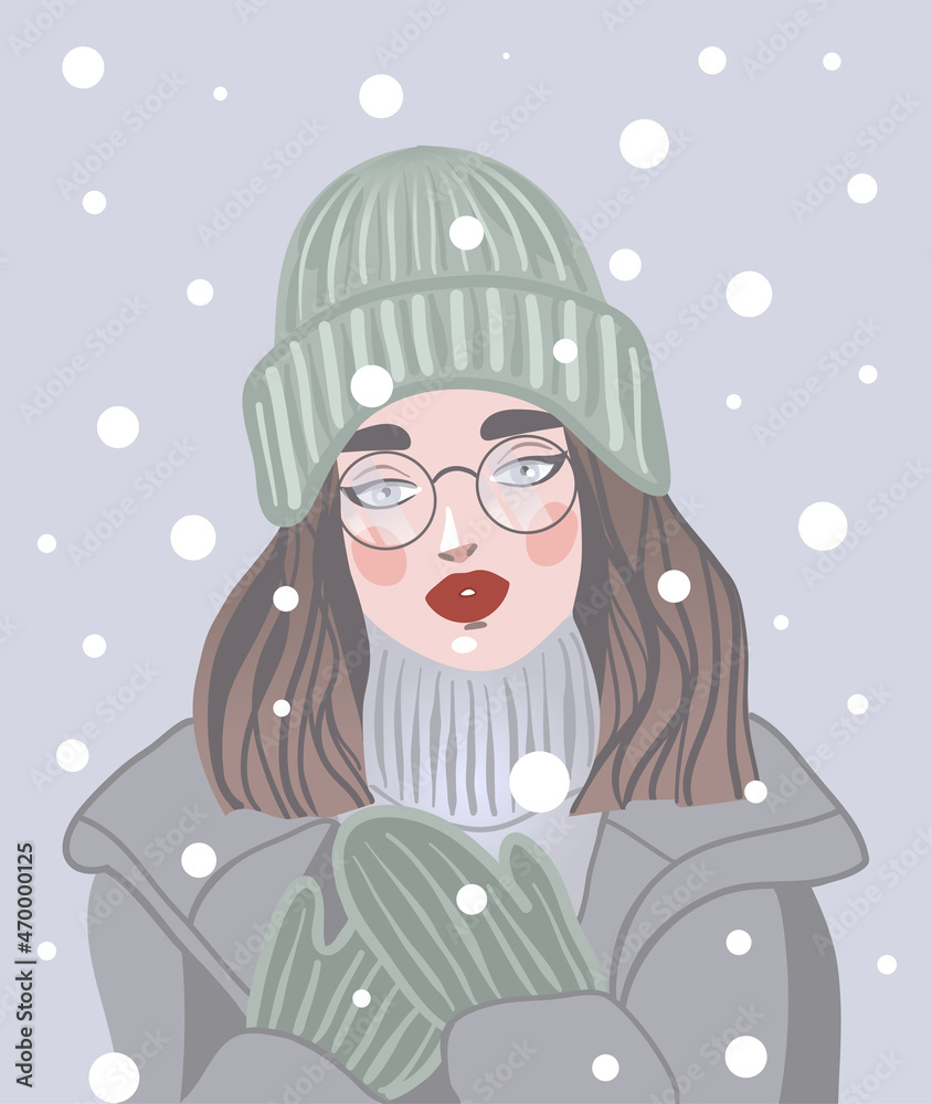 Winter portrait of young beautiful woman wearing coat, hat and gloves Winter portrait of young beautiful woman wearing coat, hat and gloves