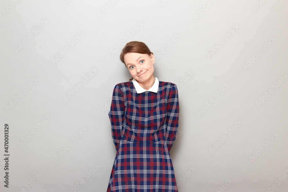 Portrait of funny confused young woman making silly goofy face Portrait of funny confused young woman making silly goofy face