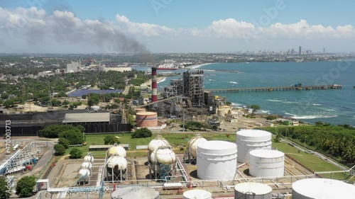 Dominican Petroleum Refinery and Haina port in background San Cristobal, Dominican Republic. Aerial reverse photo