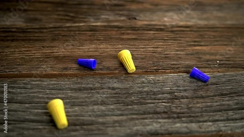 Electrical wire connector falling down in slow motion