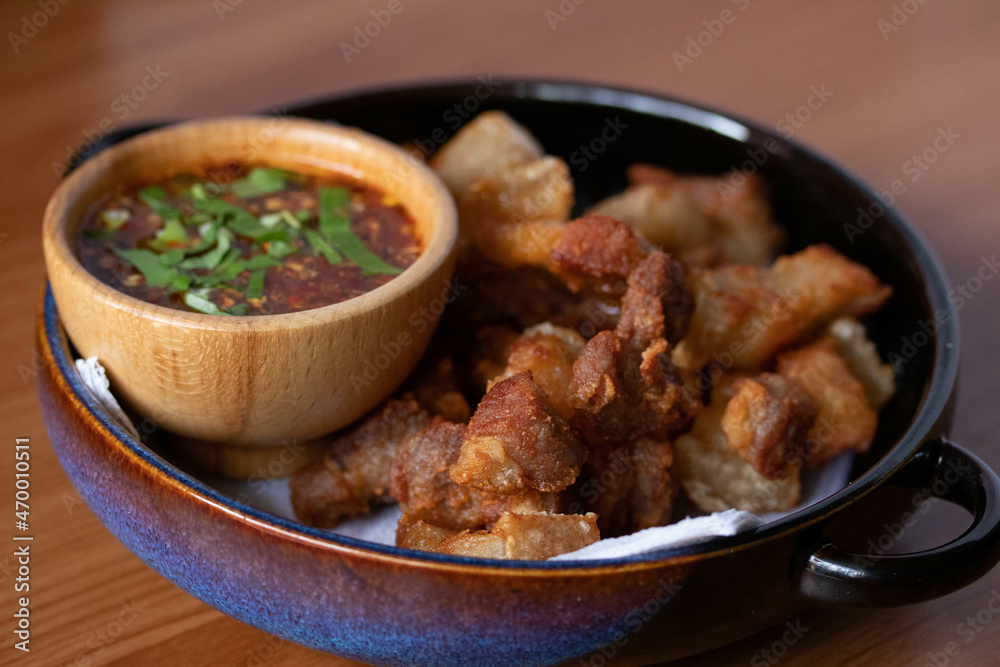 Deep-fried pork belly with fish sauce and spicy dipping sauce Deep-fried pork belly with fish sauce and spicy dipping sauce