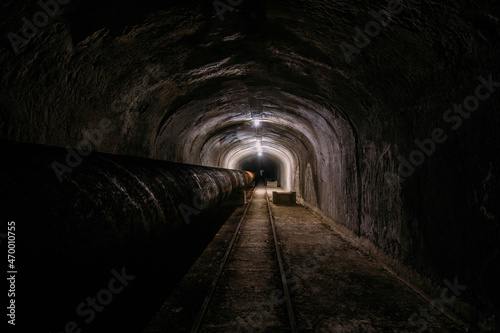 Vaulted concrete underground tunnel of sewer  heating duct or water supply system