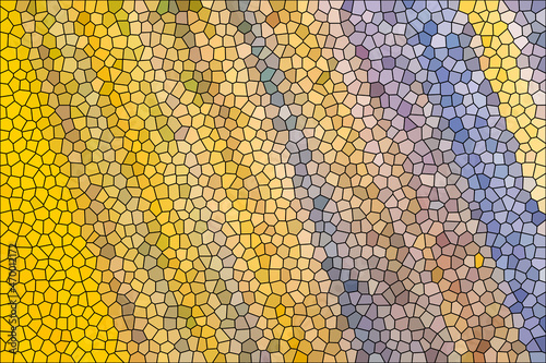 Close up stained glass surface with yellow, grey and blue particles