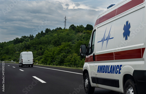 Ambulance. Special medical vehicles. Ambulance van on road. Ambulance service van on street. Ambulances drive on the new highway.