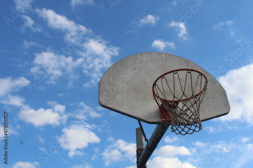 basketball hoop on blue sky background