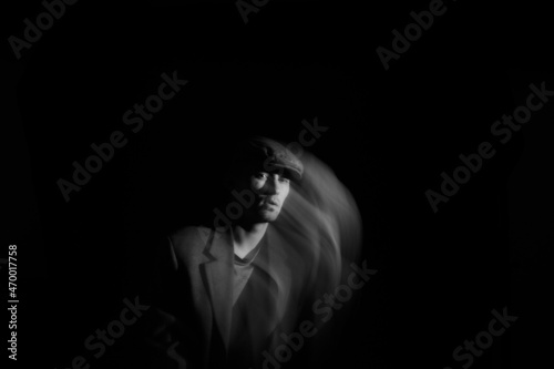 Portrait blurred in the dark.Portrait in motion.