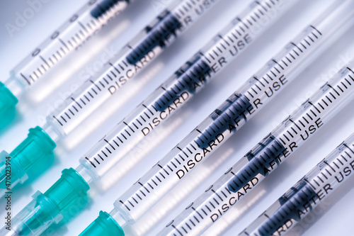 Coronavirus vaccination against SARS-CoV-2. Close up of medical syringes with COVID-19 vaccine.