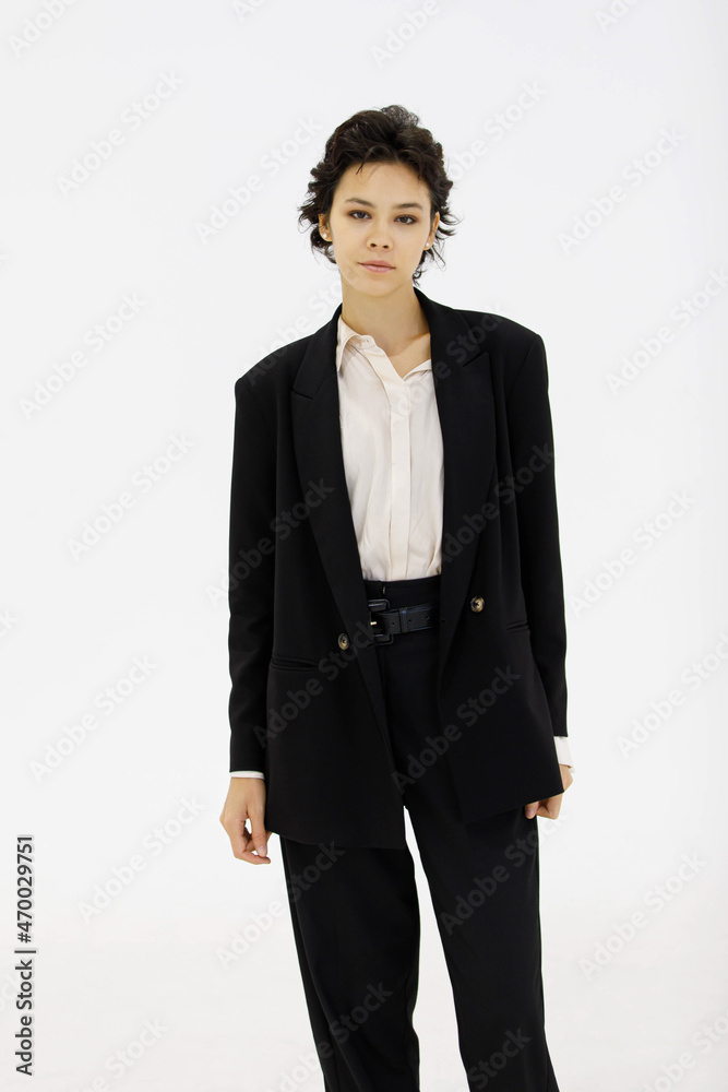 Serious businesswoman in suit on white background Serious businesswoman in suit on white background