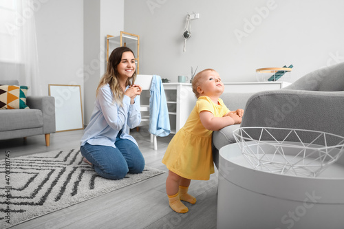 Cute baby girl in yellow dr...