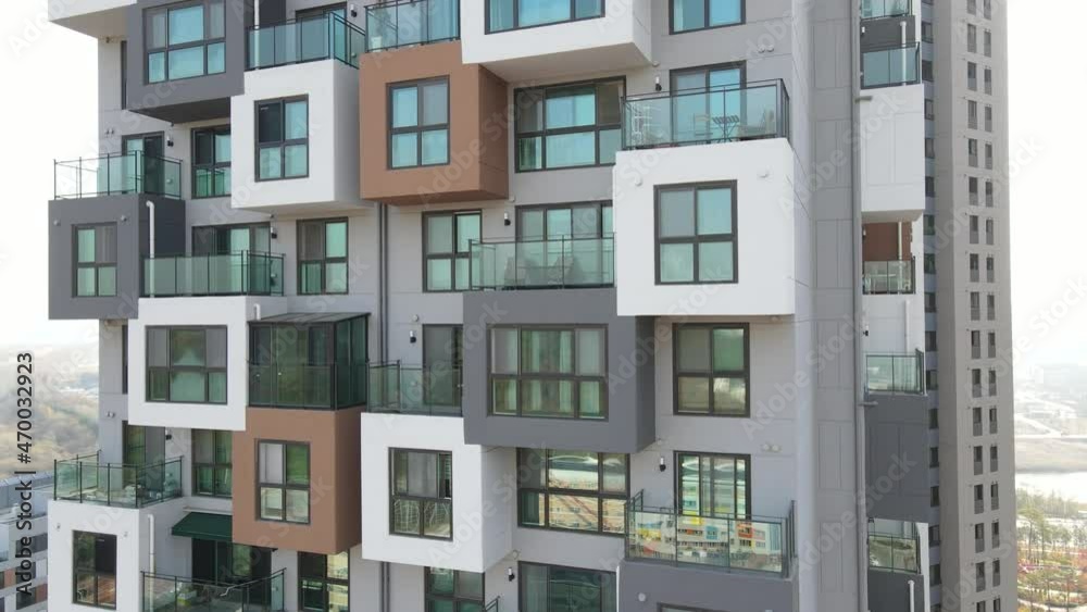 The modern building of residential complex close-up, urban geometry, aerial view. The modern building of residential complex close-up, urban geometry, aerial view.