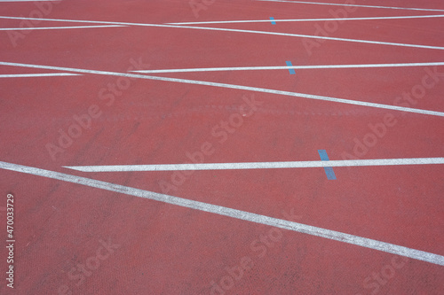 Blank running tracks white in stadium for competition or ordering concept. High quality photo