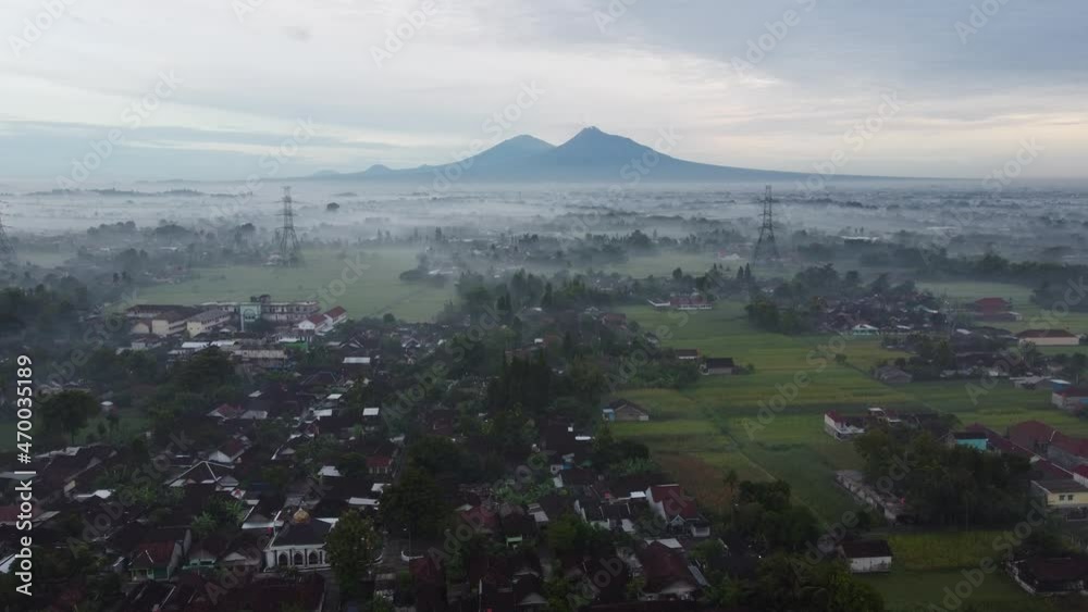Beautiful and exotic morning views of two mountains. Aerial footage Beautiful and exotic morning views of two mountains. Aerial footage