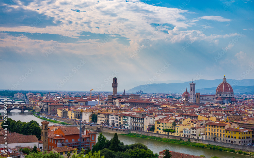 A view on Florence city from Piazalle Michelangelo viewpoint on a cloudy day