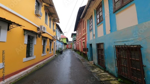 colorful street in Panaji, Goa, India. typical arcitecture on a pretty street. A walk through Fontainhas, A Colourful Portuguese Colony photo