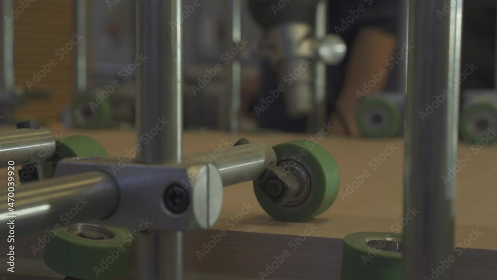 Handheld view of roller working for wooden plank production. Close-up Handheld view of roller working for wooden plank production. Close-up