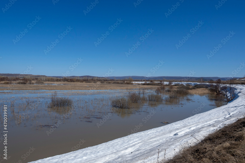 Spring flood. Flooded floodplain of the river. Snow melting. Spring flood. Flooded floodplain of the river. Snow melting.