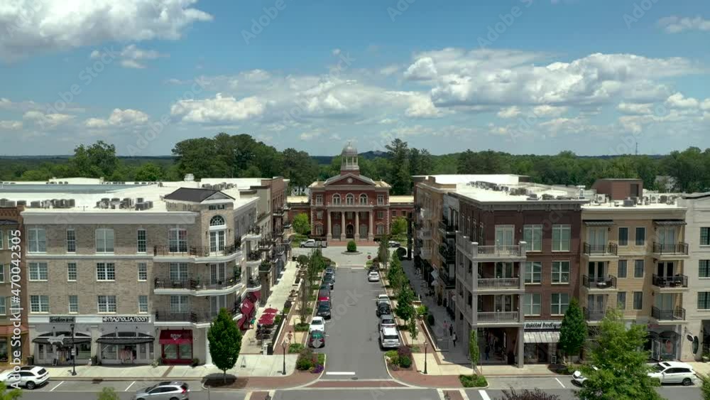 Drone shot slowly approaching city hall in Alpharetta, Georgia in the summer time.