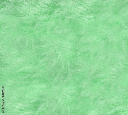  Furry light green Synthetic Fabric Background .