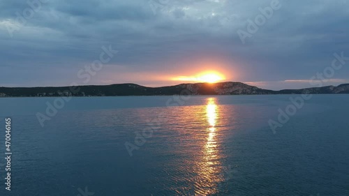 Breathtaking aerial sunset view of the famous Navarino bay and the rock formation of the famous Sphacteria island. Located near Pylos town in Messenia prefecture, Peloponnese, Greece. photo