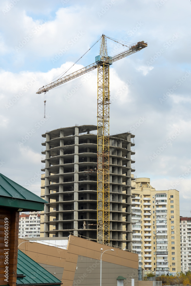 Construction crane next a building site Construction crane next a building site