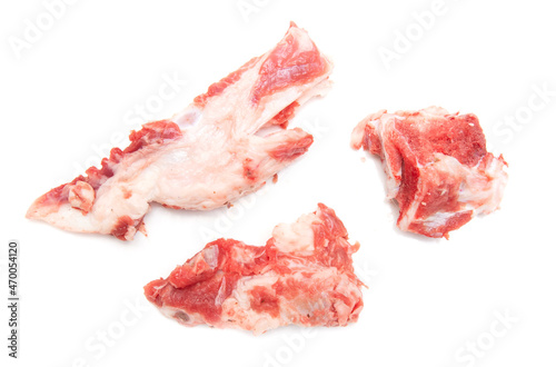Bone with red meat on a white background.
