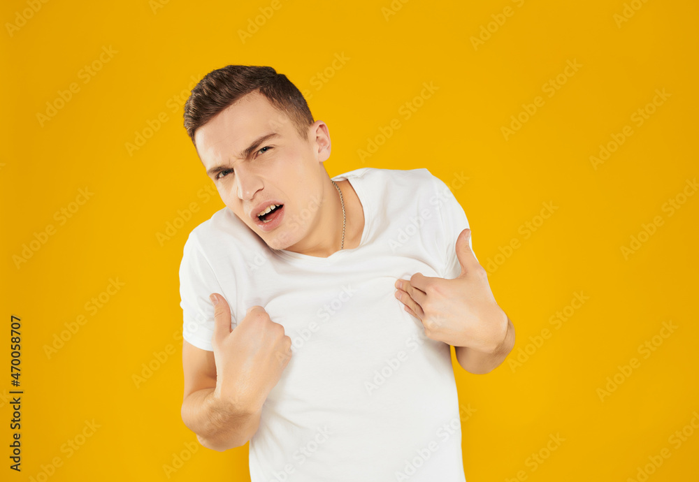 man in a white t-shirt business card manager copy space yellow background man in a white t-shirt business card manager copy space yellow background