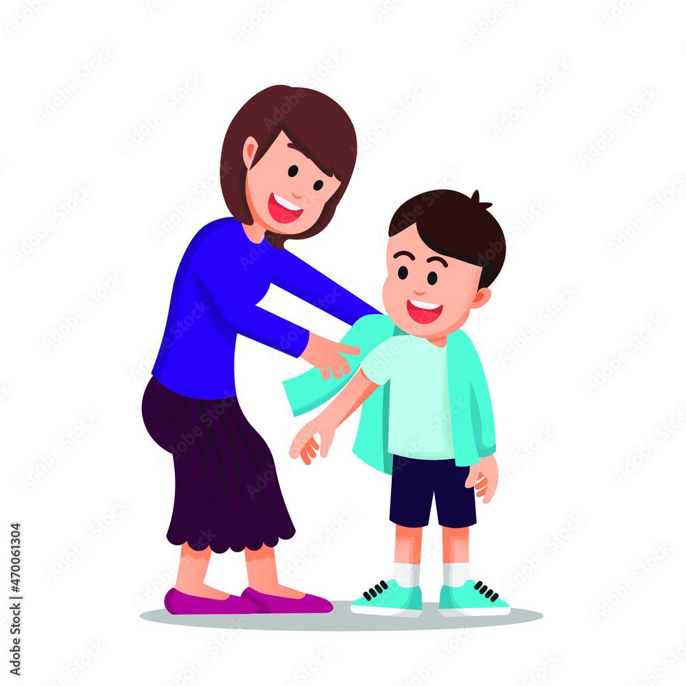 A mother helps her son to get dressed