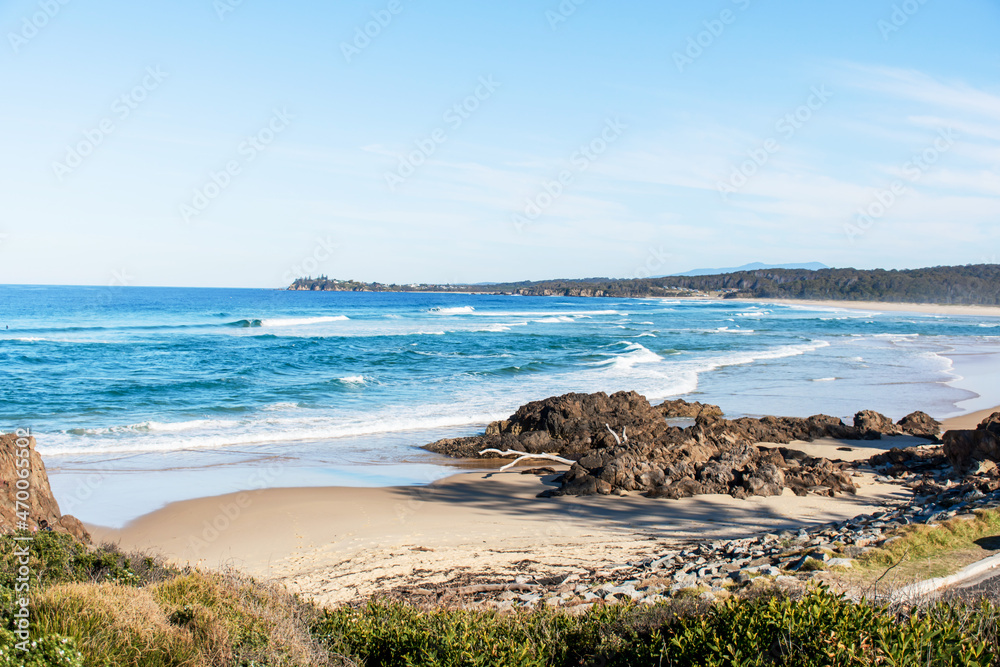 Ocean waves and sandy beach a sunny day. Nature tropical paradise background. Tuross Head, NSW, Australia