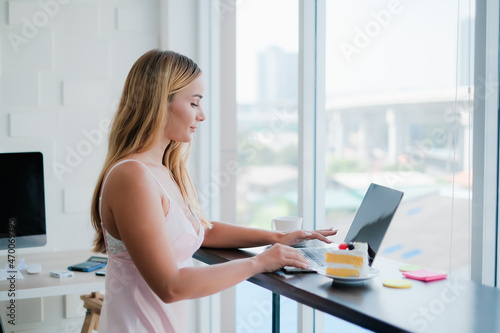 caucasian woman playing tablet in morning Free Download caucasian woman playing tablet in morning - GFXLoad