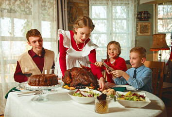 Family having a thanksgiving dinner together, 50s retro style 