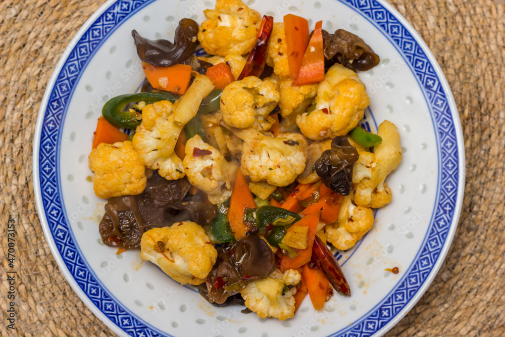 Chinese vegetarian dish with cauliflower and carrot Chinese vegetarian dish with cauliflower and carrot